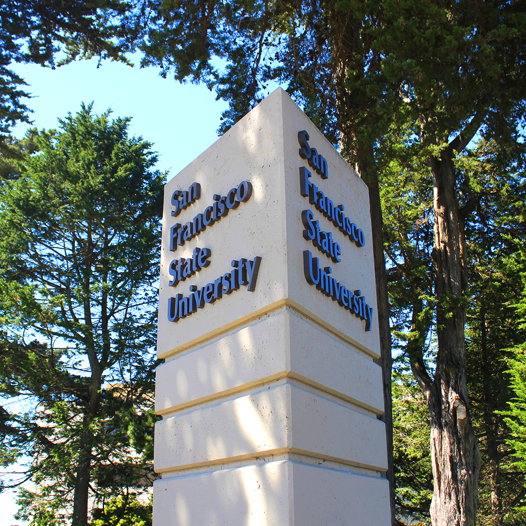San Francisco State University sign and trees