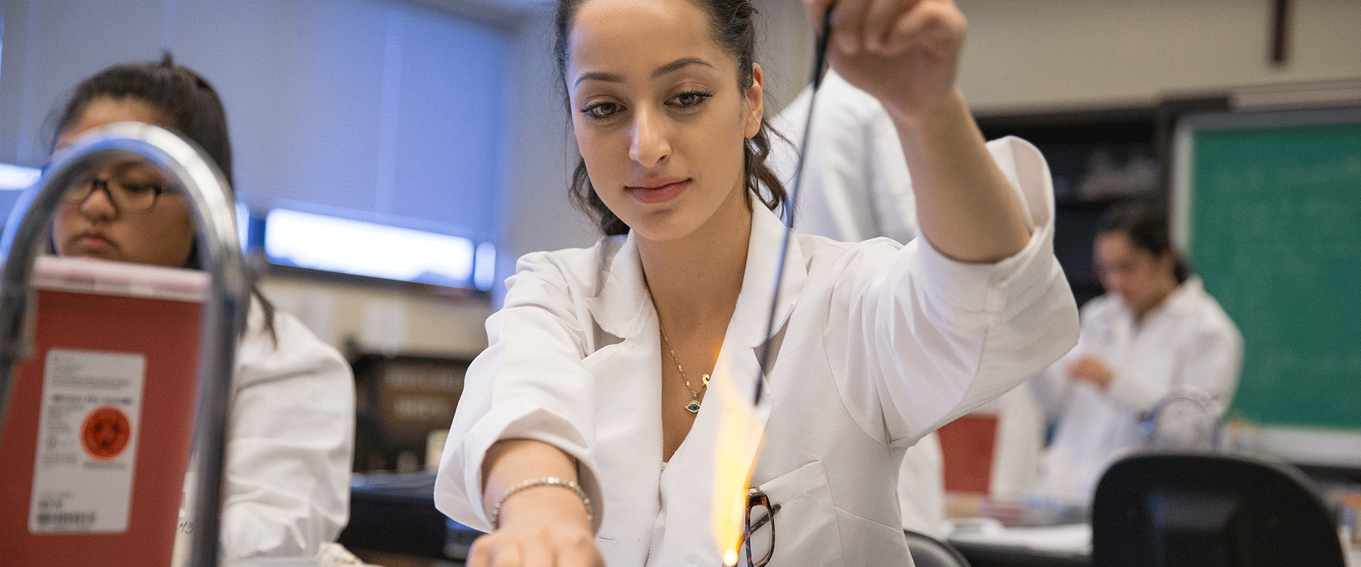 Chemistry student works with a flame